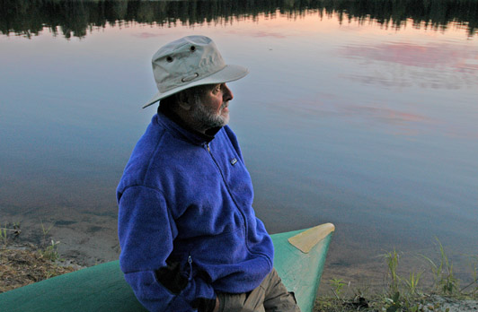 jerry sitting on a canoe anticipating the next course